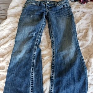 Silver boot cut jeans style tuesday, size medium to small. Color blue
